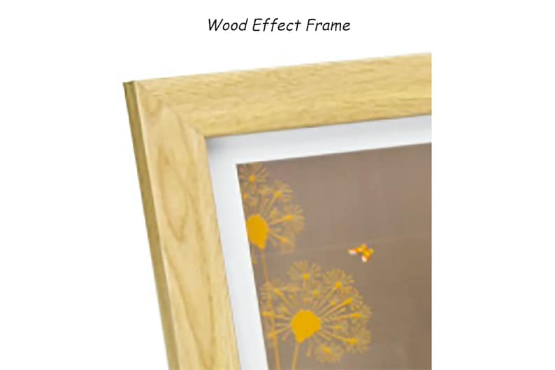 May include: A light-colored wood effect frame with a white border. The frame surrounds a picture with a brown background and yellow dandelion and bee graphics. The text "Wood Effect Frame" is at the top.