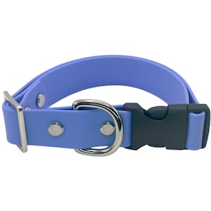 May include: A periwinkle blue dog collar with a black plastic buckle and a silver-colored metal D-ring and hardware. The collar is made of a flexible, waterproof material.