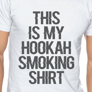 May include: White t-shirt with the text "This is my hookah smoking shirt" printed in black.