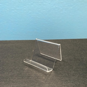 2&quot; Non Adjustable acrylic display stand. Clear acrylic. Thickness .100