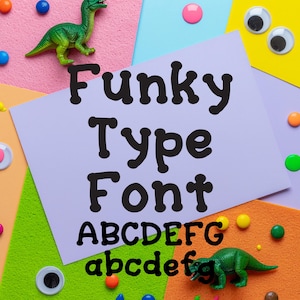 May include: A light purple paper with the words "Funky Type Font" in bold black letters. The alphabet is displayed in both uppercase and lowercase. The image is decorated with colorful craft supplies and toy dinosaurs.