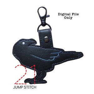 May include: Black crow keyring with blue stitching. The keyring is made of faux leather and has a jump stitch detail. Digital file only.