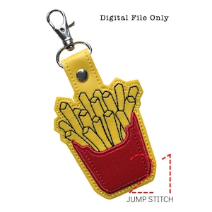May include: Yellow and red embroidered keychain shaped like a bag of french fries. The keychain has a jump stitch detail.