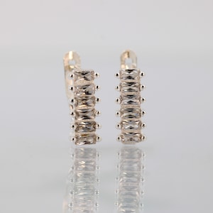 Minimalist Silver Crown-inspired Hoop Earrings with Baguette Stones