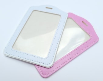 Clean all white or pink carrier for 2-3 cards. Student photo ID, teacher name badge, drivers license, key card. For lanyard / badge reel