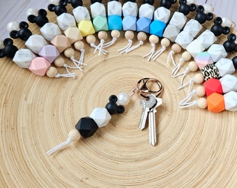 Beaded keychain with mouse ears. Customize with 17 color choices. Rose gold keyring and clasp. Classroom safe.