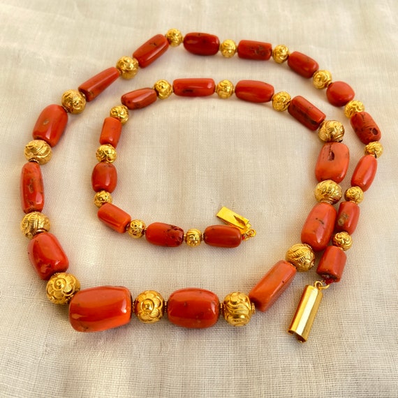 Carved coral best sale necklace