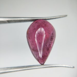 5.5 Carat Natural Pink Tourmaline : Pear Cabochon , Polished , 14.4 x 9.7 x 6 mm , AA Grade , Luster Pink Color , Untreated and Natural.