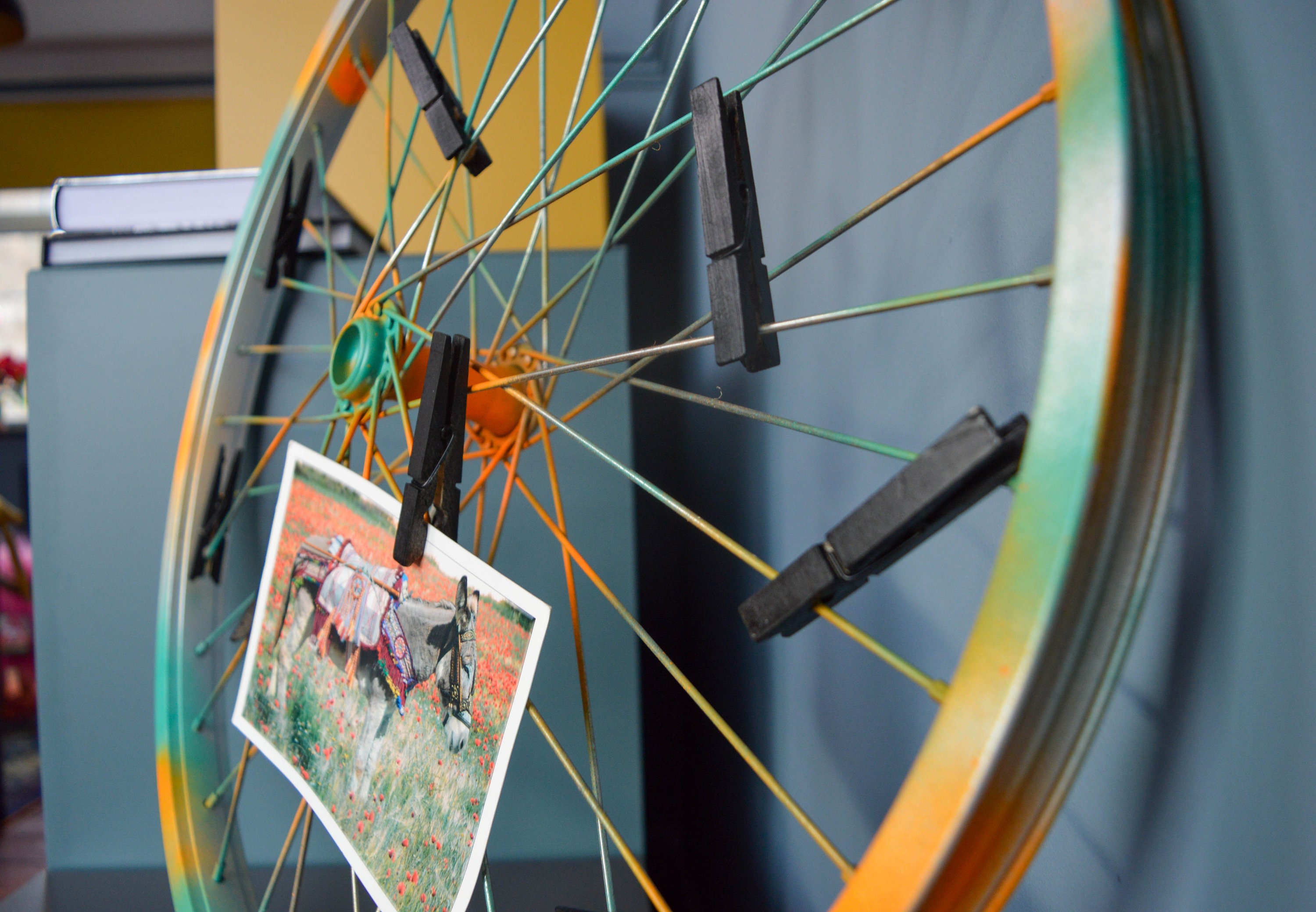 Repurposed bike wheel frame. Photo display. Etsy