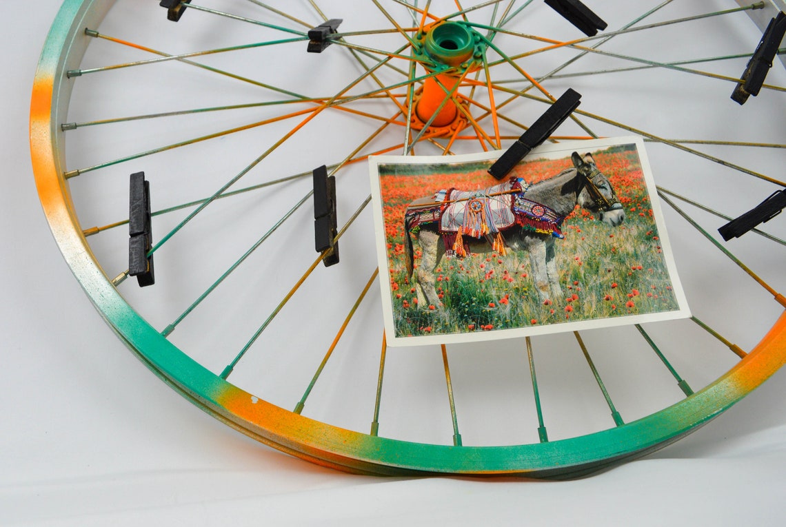 Repurposed bike wheel frame. Photo display. Etsy