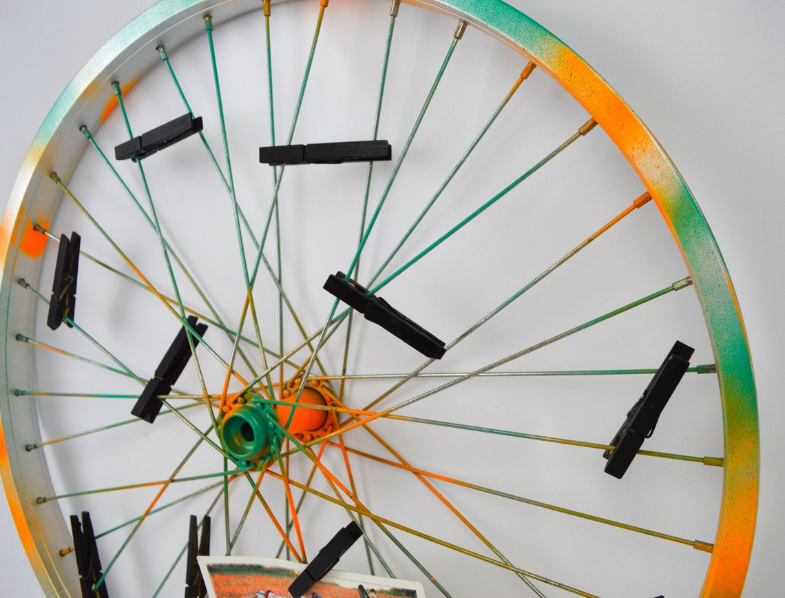 Repurposed bike wheel frame. Photo display. Etsy