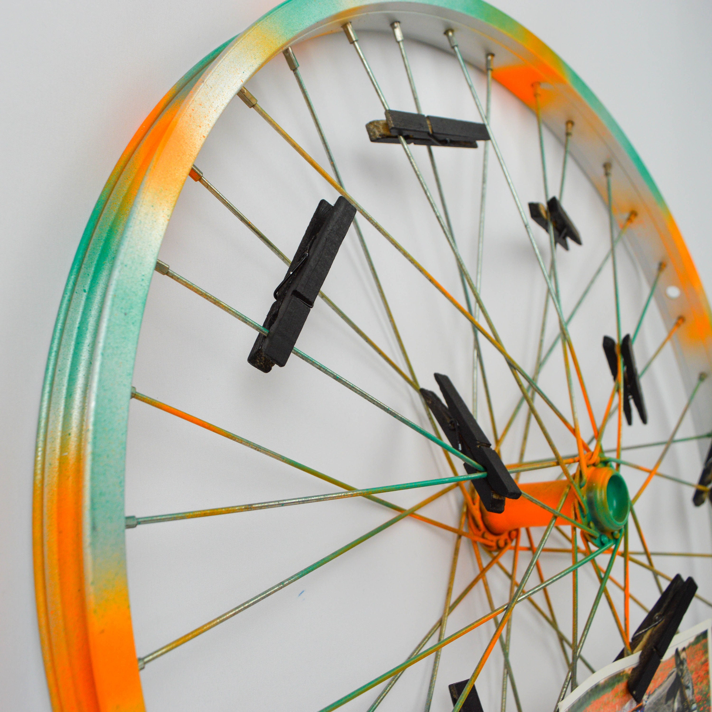 Repurposed bike wheel frame. Photo display. Etsy