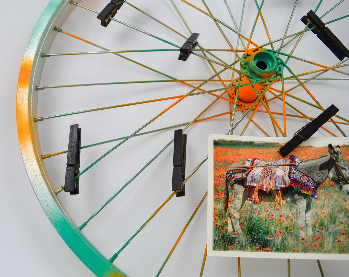 Repurposed bike wheel frame. Photo display. Etsy