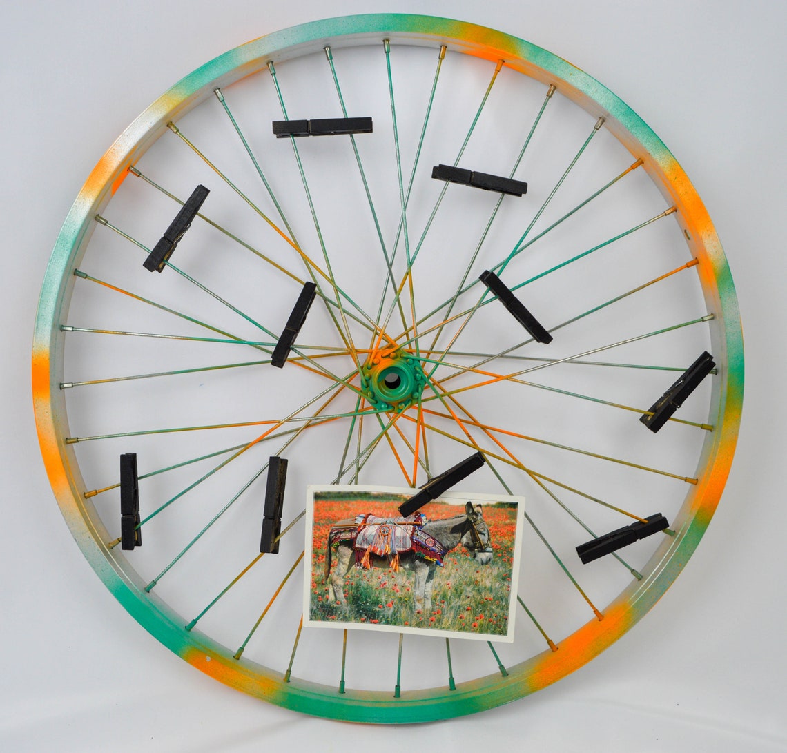 Repurposed bike wheel frame. Photo display. Etsy