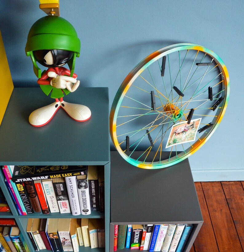 Repurposed bike wheel frame. Photo display. Etsy