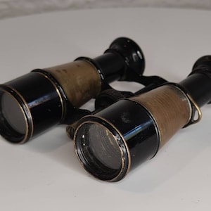Petites jumelles en laiton antique