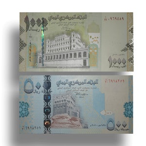 Peut inclure: Un billet de banque yéménite de 500 riyals représentant un bâtiment avec un toit rouge et un motif géométrique bleu et blanc. Le texte sur le billet indique "La Banque Centrale du Yémen" et "Cinq Cents Riyals".