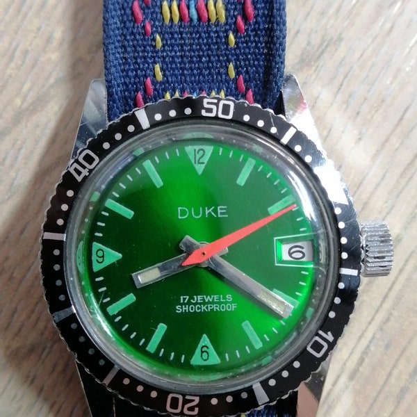 vintage DUKE 17 Jewels Wrist Watch, SS Case, Beautiful Strap. rare. Très bien!