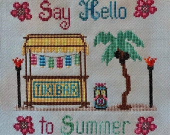 May include: Cross-stitch embroidery design featuring a tiki bar with a sign that says "Tiki Bar", palm trees, flowers, and the text "Say Hello to Summer".