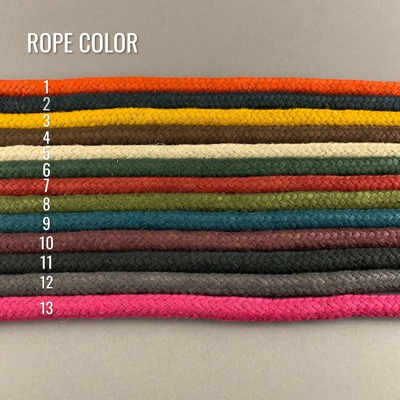 May include: A chart showing 13 different colors of rope. The rope colors are: orange, yellow, brown, beige, red, green, teal, maroon, black, gray, and pink. The chart is labeled "ROPE COLOR" and each color is numbered 1 through 13.