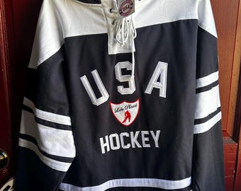 Camiseta de hockey de EE. UU. con etiquetas