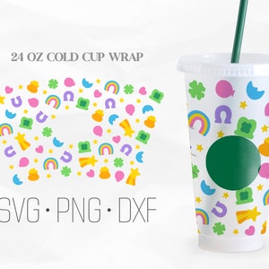 May include: A 24 oz cold cup wrap with a design of rainbows, shamrocks, stars, horseshoes, and gold coins. The wrap is designed to fit a standard cold cup. The text "SVG. PNG. DXF" is also included in the image.