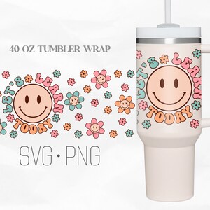May include: A 40 ounce tumbler wrap design featuring a smiling face with the text "Let's Learn Today" in a retro font. The design is surrounded by colorful flowers.
