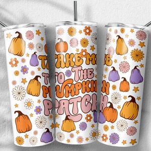 May include: White stainless steel tumbler with a autumn-themed design. The tumbler features a white background with orange, purple, and yellow pumpkins, flowers, and stars. The text "Take Me To The Pumpkin Patch" is written in a retro font.