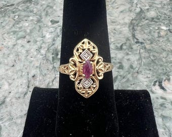 10K Gold Filigree Ring with Marquise Ruby and Diamond Accents.