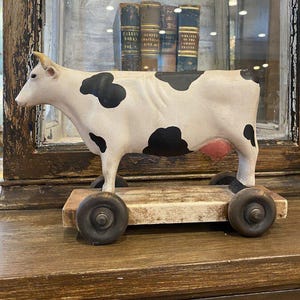 Signed Ceramic Wheely Cow