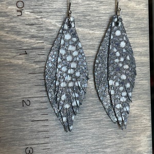 Feather fringe, teardrop fringe & petal fringe earrings. Stingray grey (silver with blue hues and white dots.)