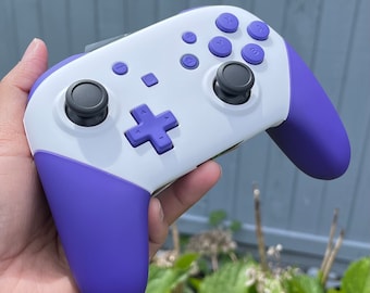 Dominio del juego desatado: controlador Switch Pro de color blanco púrpura hermoso modificado a medida con caja original y cable de carga