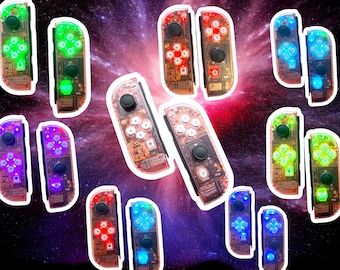 May include: A set of ten colorful, transparent Nintendo Switch Joy-Con controllers with different colored buttons. The controllers are arranged in a circle on a background of a galaxy with stars and nebulae.