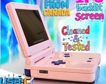 May include: A pink Game Boy Advance SP with a USB-C mod, a bright IPS backlit screen, and the text "SHIPS FROM CANADA" and "Cleaned & Tested" on the background.