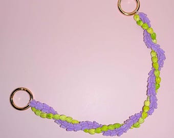 Corona di fiori di pikake con borsa lei