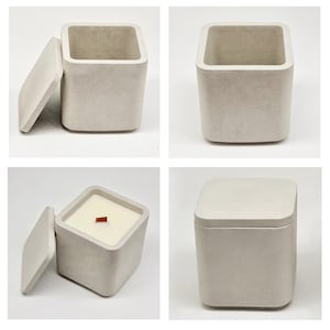 May include: A square concrete candle holder with a lid. The candle holder is a light gray color and has a rough texture. The lid is slightly ajar, revealing a white candle with a wooden wick inside.