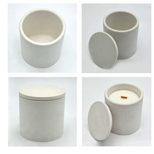 May include: Four white concrete candle jars with lids. Two jars are empty and two jars have a white candle inside. One of the candles has a wooden wick.