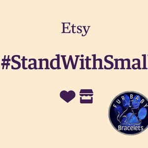 May include: Image with the text "Etsy" and "#StandWithSmall" in a dark purple font. A purple heart and a shop icon are also present. The image includes a circular logo for "Fur Baby Bracelets" with a dog silhouette.