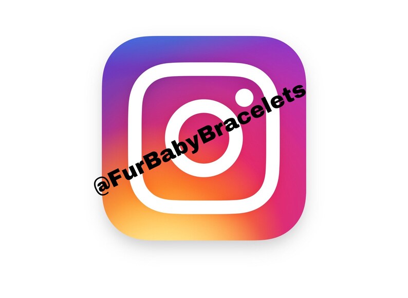May include: Instagram logo with a gradient background of purple, pink, and orange. The white outline of the camera icon is visible, with the text "@FurBabyBracelets" in black diagonally across the image.
