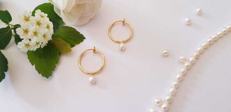 clip system earrings: earrings creoles with un pierced ear clips gilded with fine gold and fresh water pearl