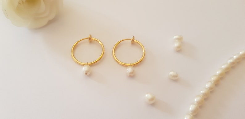 clip system earrings: earrings creoles with un pierced ear clips gilded with fine gold and fresh water pearl