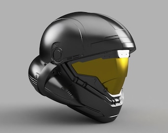 May include: A black helmet with a yellow visor. The helmet has a futuristic design with a lot of detail.