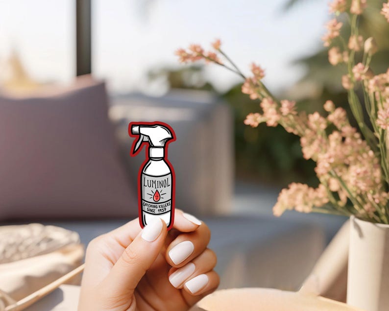 May include: A white spray bottle with a red outline and the text "Luminol Catching Killers Since 1928" on the label.