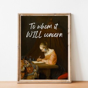 Puede incluir: Una impresión enmarcada con una pintura de una mujer escribiendo en un escritorio. El texto "To whom it WILL concern" está escrito en blanco sobre un fondo oscuro.