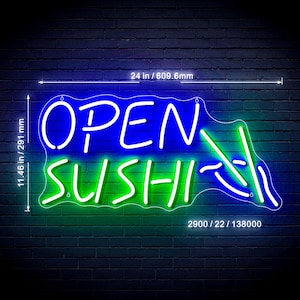 May include: A neon sign with the words "OPEN SUSHI" in blue and green. The sign is 24 inches wide and 11.46 inches tall, mounted on a dark blue brick wall. The sign has a unique shape.