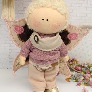 Wool hair detail on the handmade Butterfly cloth doll