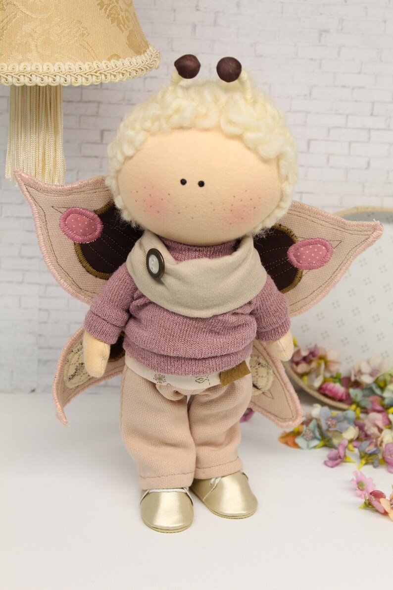Wool hair detail on the handmade Butterfly cloth doll