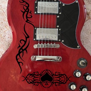 Rock Your Gear with Guitar and Bass Vinyl Decal Set - Universal Fit, Easy Peel and Stick.