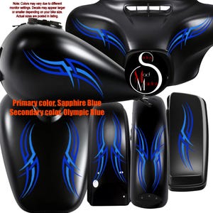 May include: Black motorcycle parts featuring blue tribal patterns. The set includes a fairing, fuel tank, and mudguards. The primary colour is Sapphire Blue, and the secondary colour is Olympic Blue. The image also includes the text "Mad Maiden".
