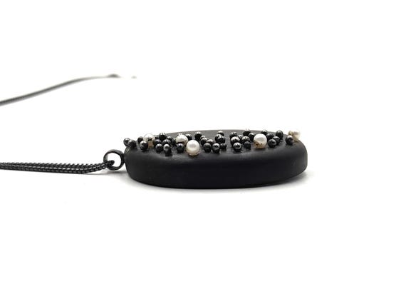 定価¥86.400【ebony】エボニー／SV K18 琥珀ネックレス 定価¥86.400